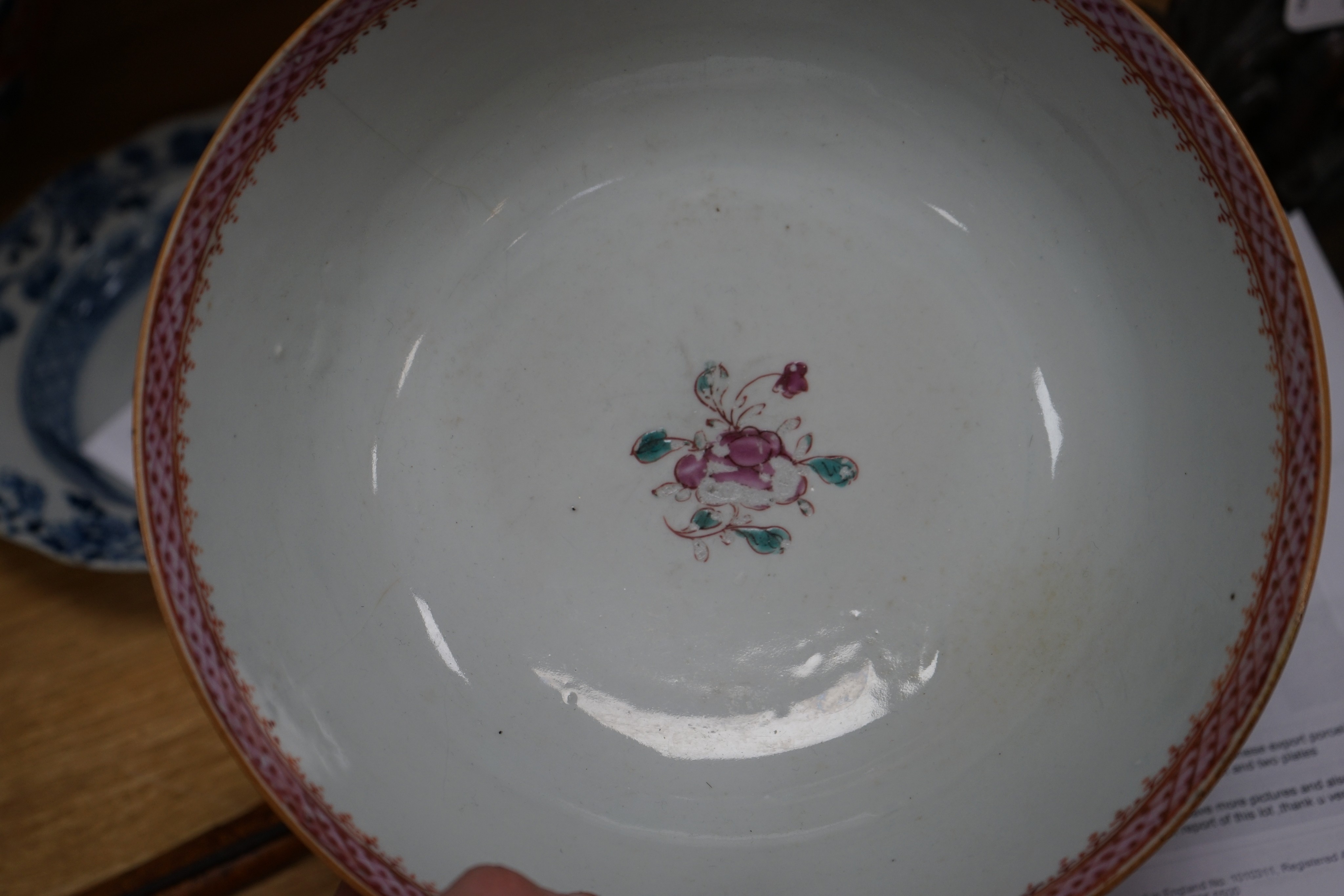 Three 18th century Chinese export porcelain bowls, largest 28 cm and two plates